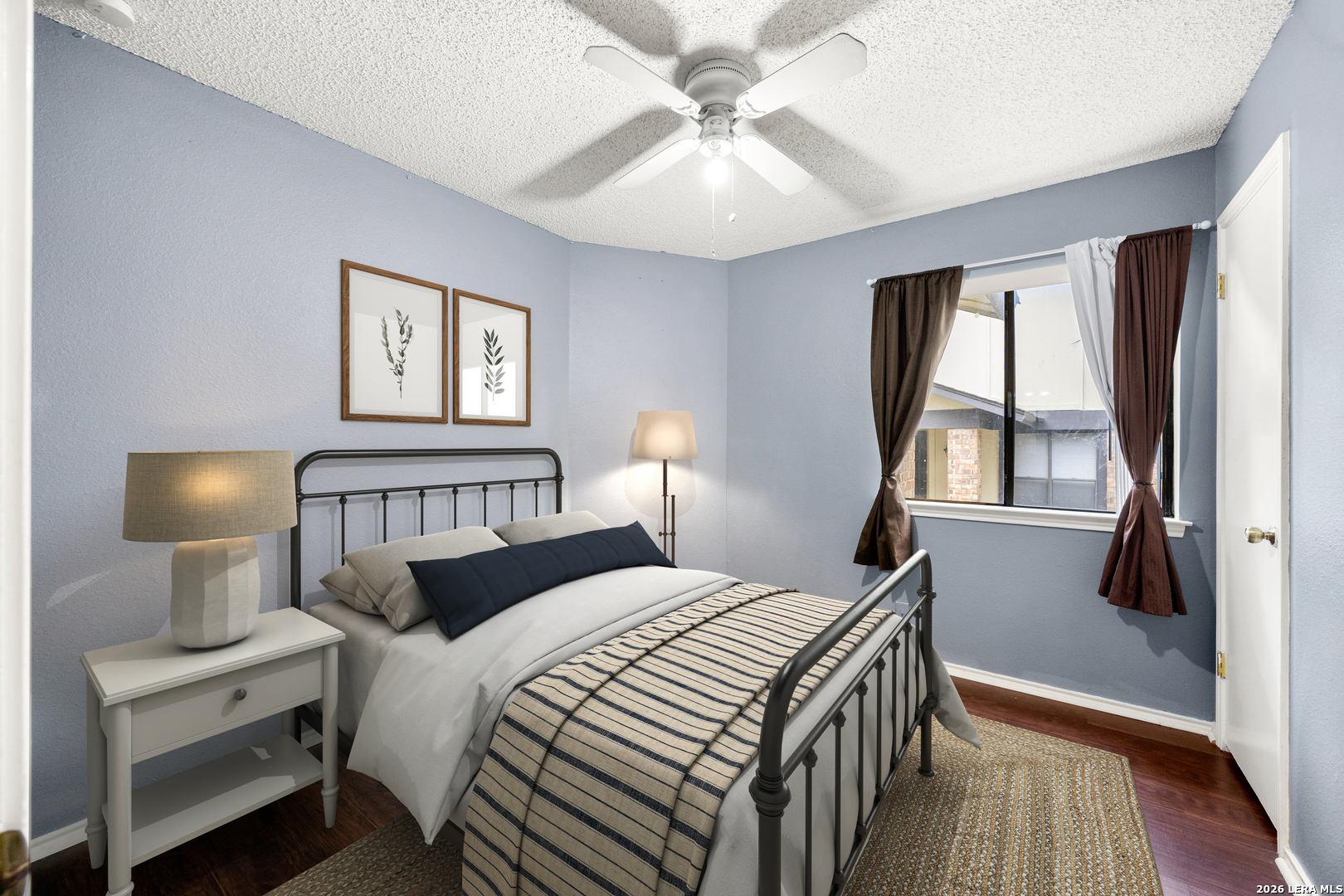 9334 Dover Ridge San Antonio, TX 78250 - Photo 8 of 42 a bedroom with a bed and a window