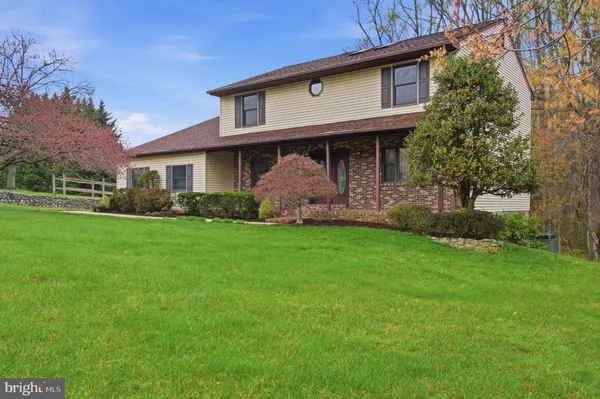 a view of a porch with a backyard