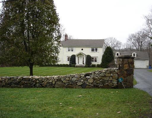 a view of a house with a park