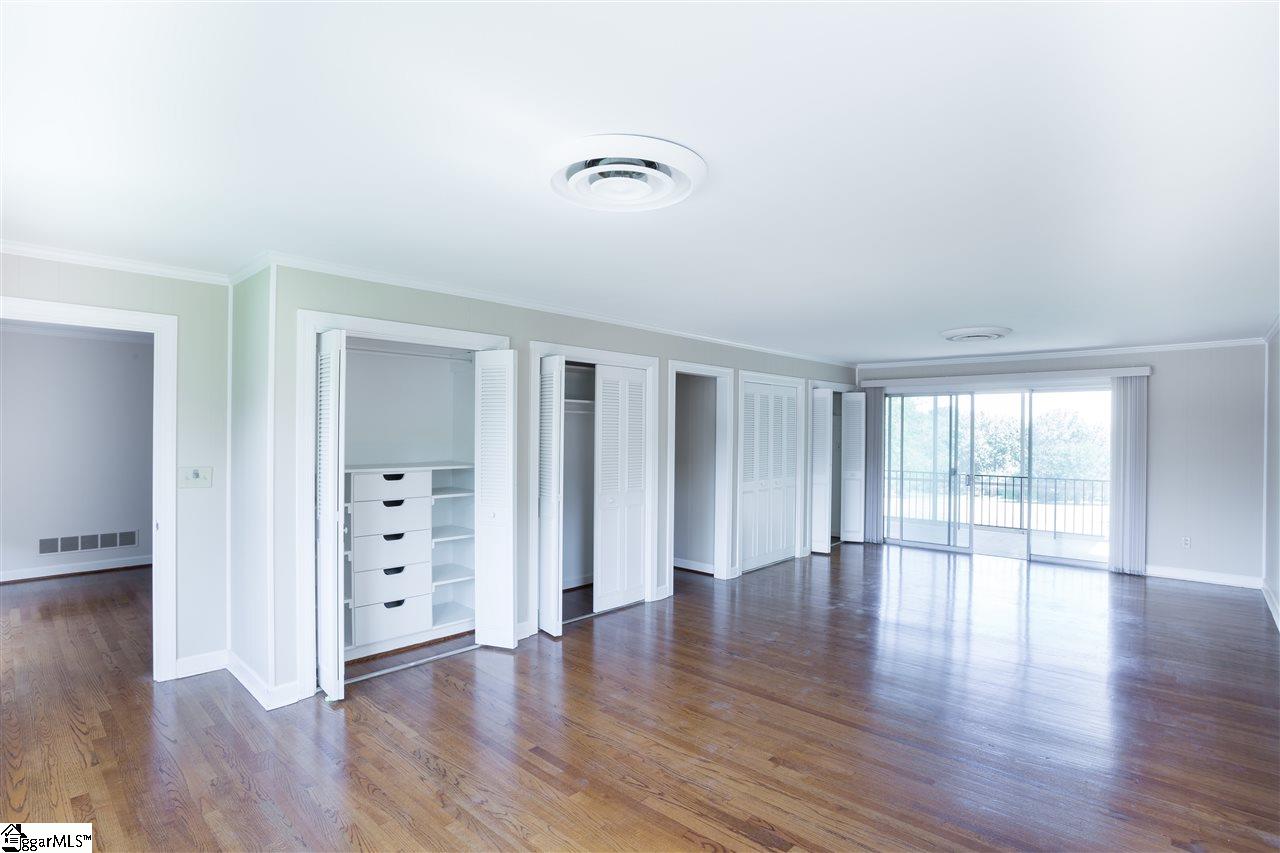 603 Pelham Road Greenville, SC 29615 - Photo 7 of 29 Great closet space with built in shelves. Doors leading out onto upstairs porch with beautiful mountain views