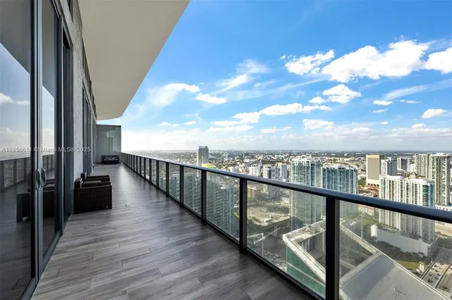 a view of livingroom with furniture and a potted plant