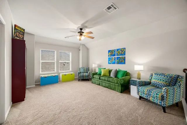 a living room with furniture and a couch
