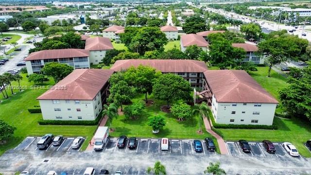 150 Southwest 134th Way, Unit 203R Pembroke Pines, FL 33027 - Photo 5 of 30 an aerial view of house with garden space and street view
