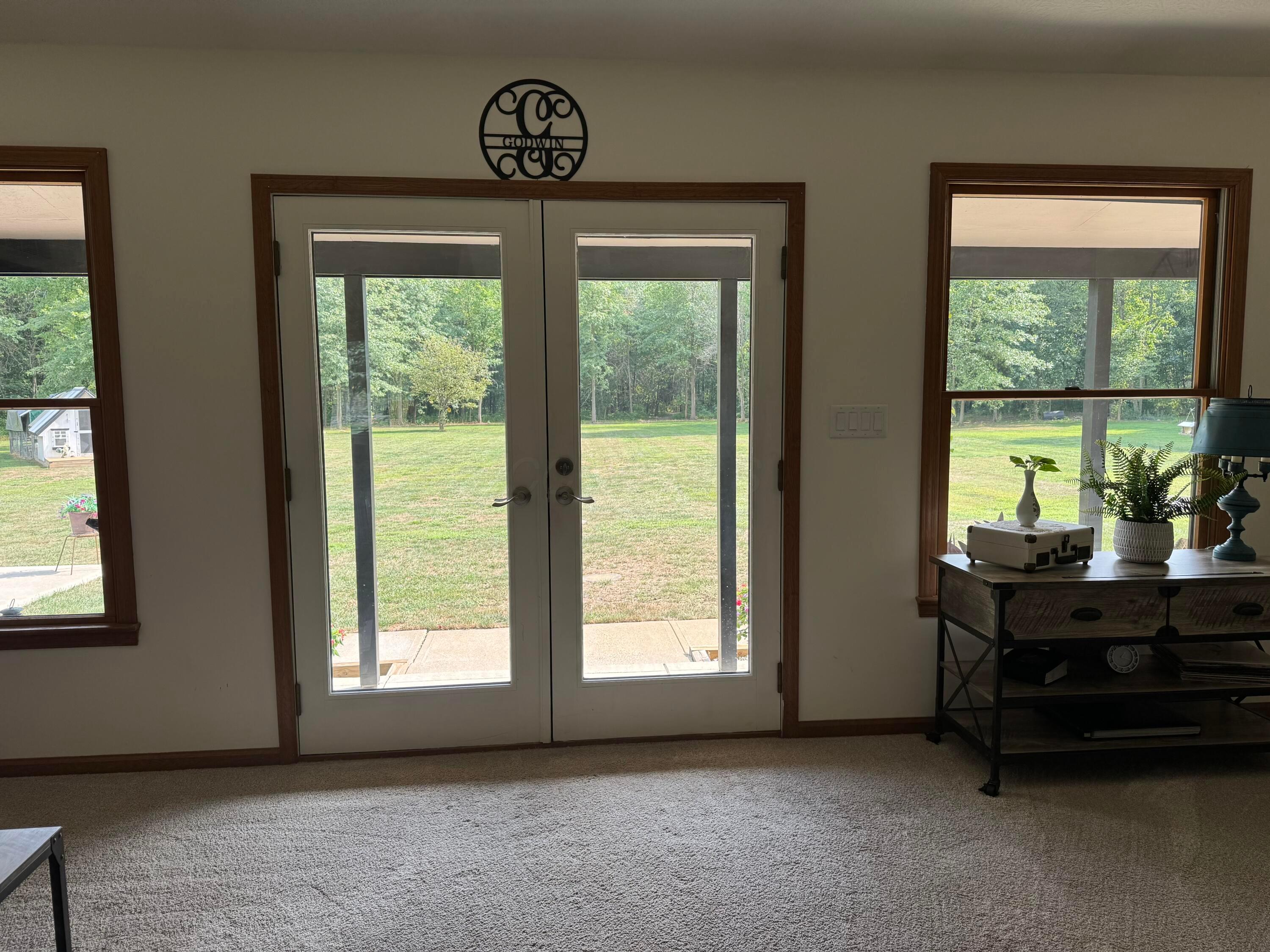 24805 Rapp-Dean Road Raymond, OH 43067 - Photo 23 of 74 Living Room w/ Doors to Back Yard
