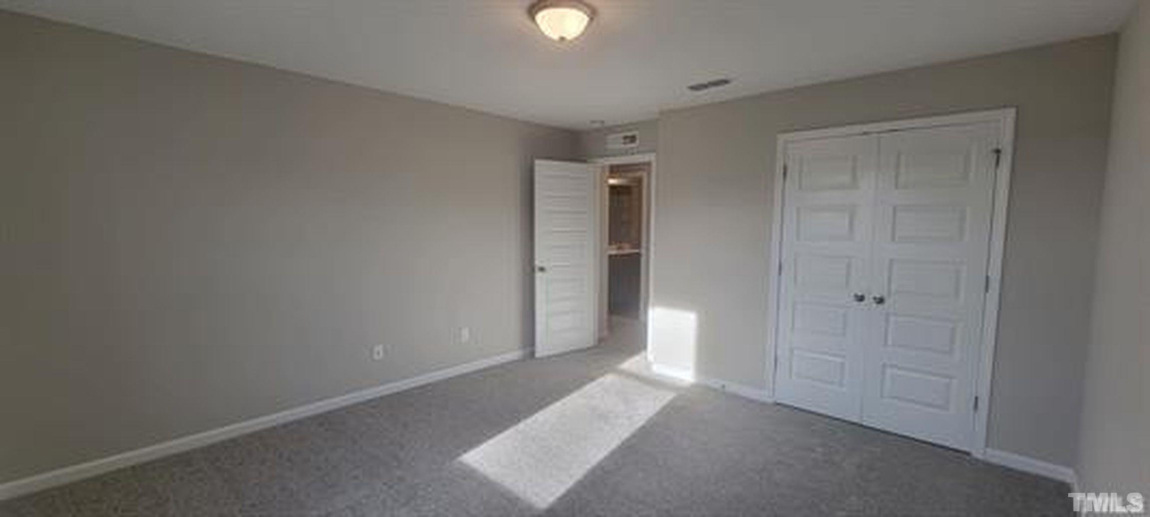 411 Rio Grande Lane Willow Spring, NC 27592 - Photo 14 of 29 a view of an empty room