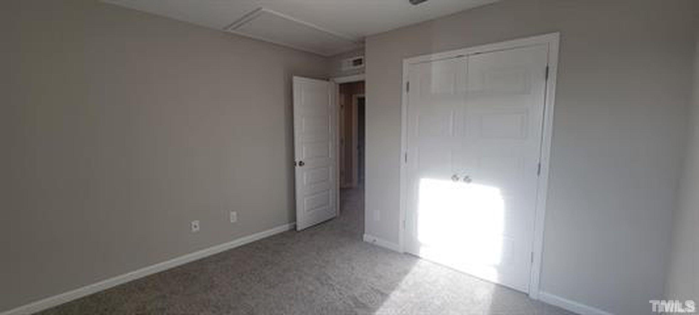 411 Rio Grande Lane Willow Spring, NC 27592 - Photo 17 of 29 a view of an empty room