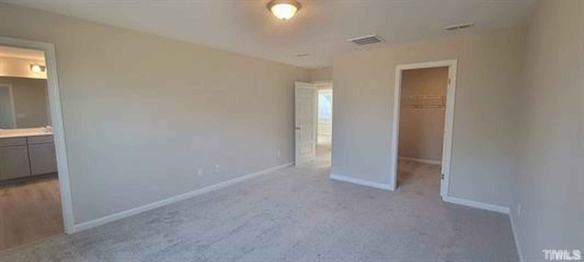 411 Rio Grande Lane Willow Spring, NC 27592 - Photo 23 of 29 a view of an empty room and window