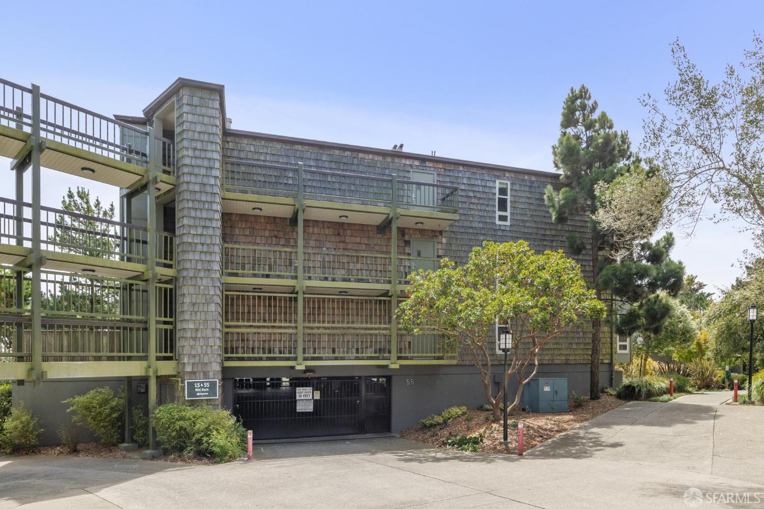 55 Red Rock Way, Unit 207 San Francisco, CA 94131 - Photo 6 of 15 a front view of a house with a yard