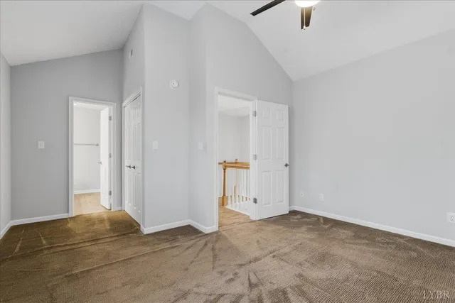 a view of a livingroom with a fireplace and wooden floor
