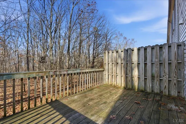 a view of a porch with wooden floor