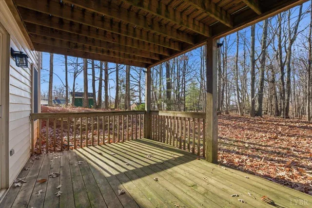 front view of a brick house with a large window
