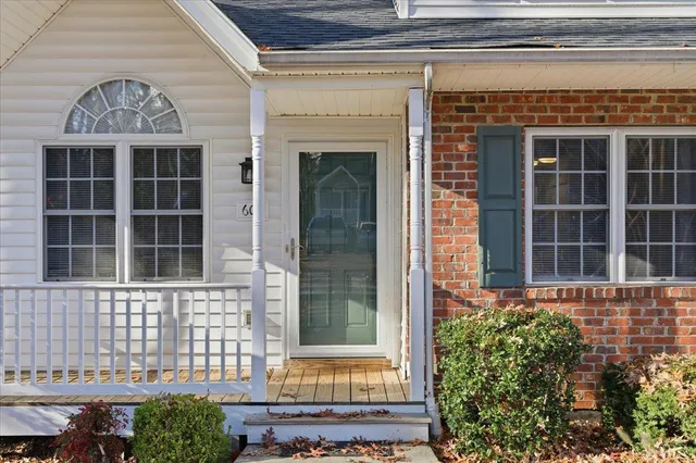 a view of a porch with a bench