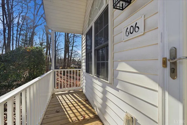 a view of a brick house with a large window