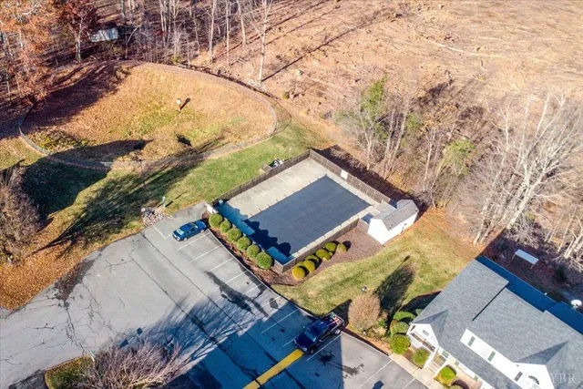 a picture of a open kitchen with a white refrigerator