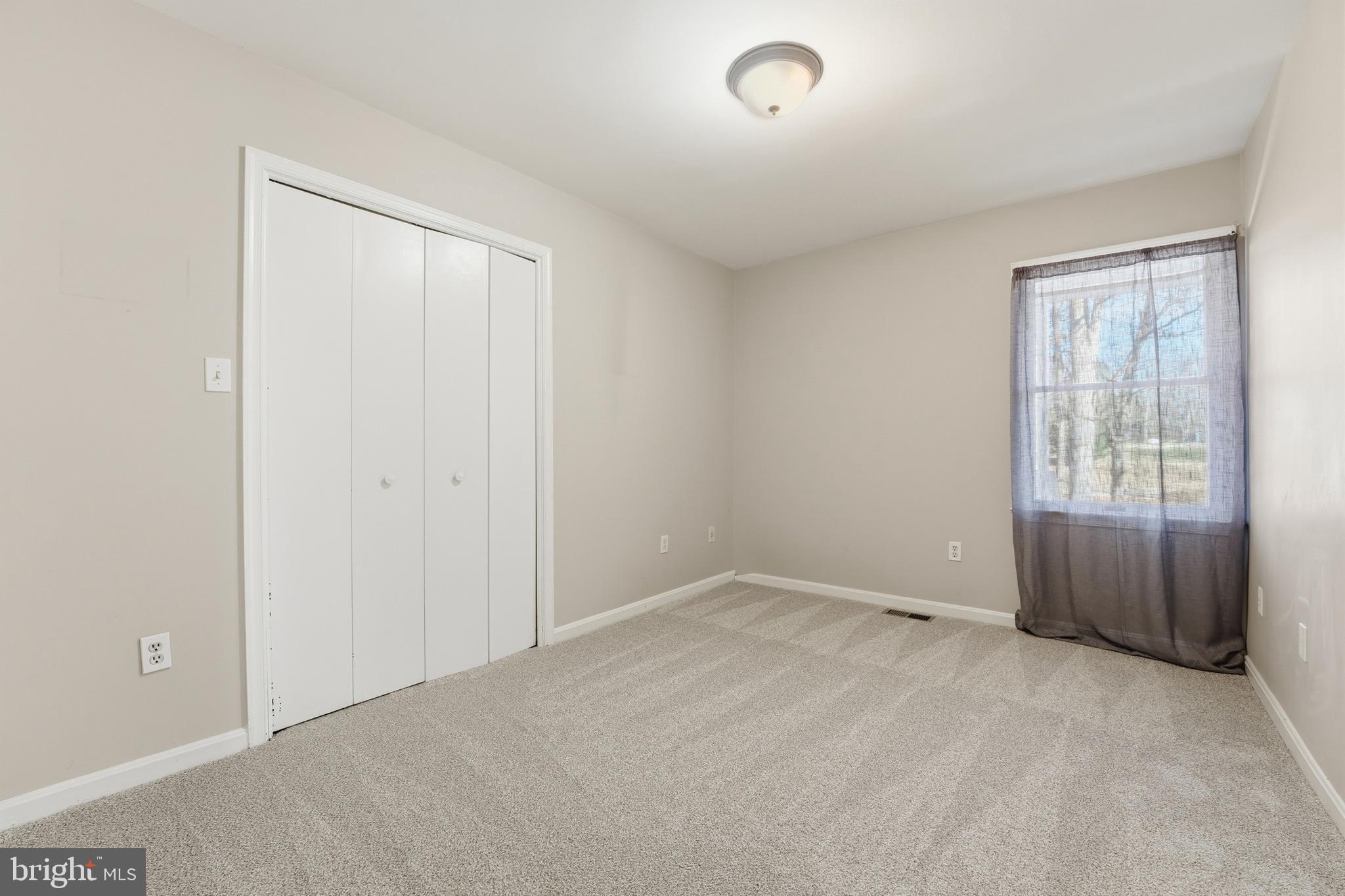 4431 Ringwood Road Nokesville, VA 20181 - Photo 7 of 14 an empty room with windows