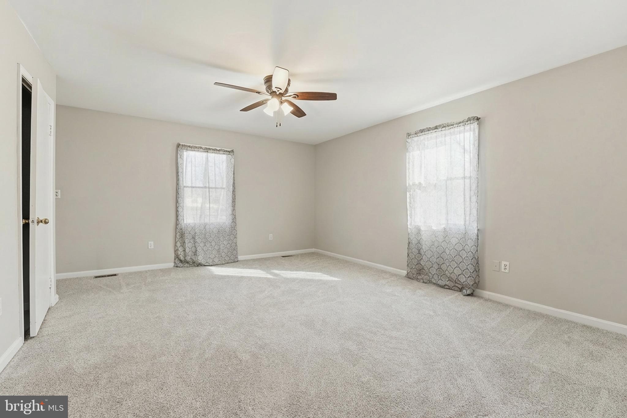 4431 Ringwood Road Nokesville, VA 20181 - Photo 9 of 14 a view of an empty room with a window