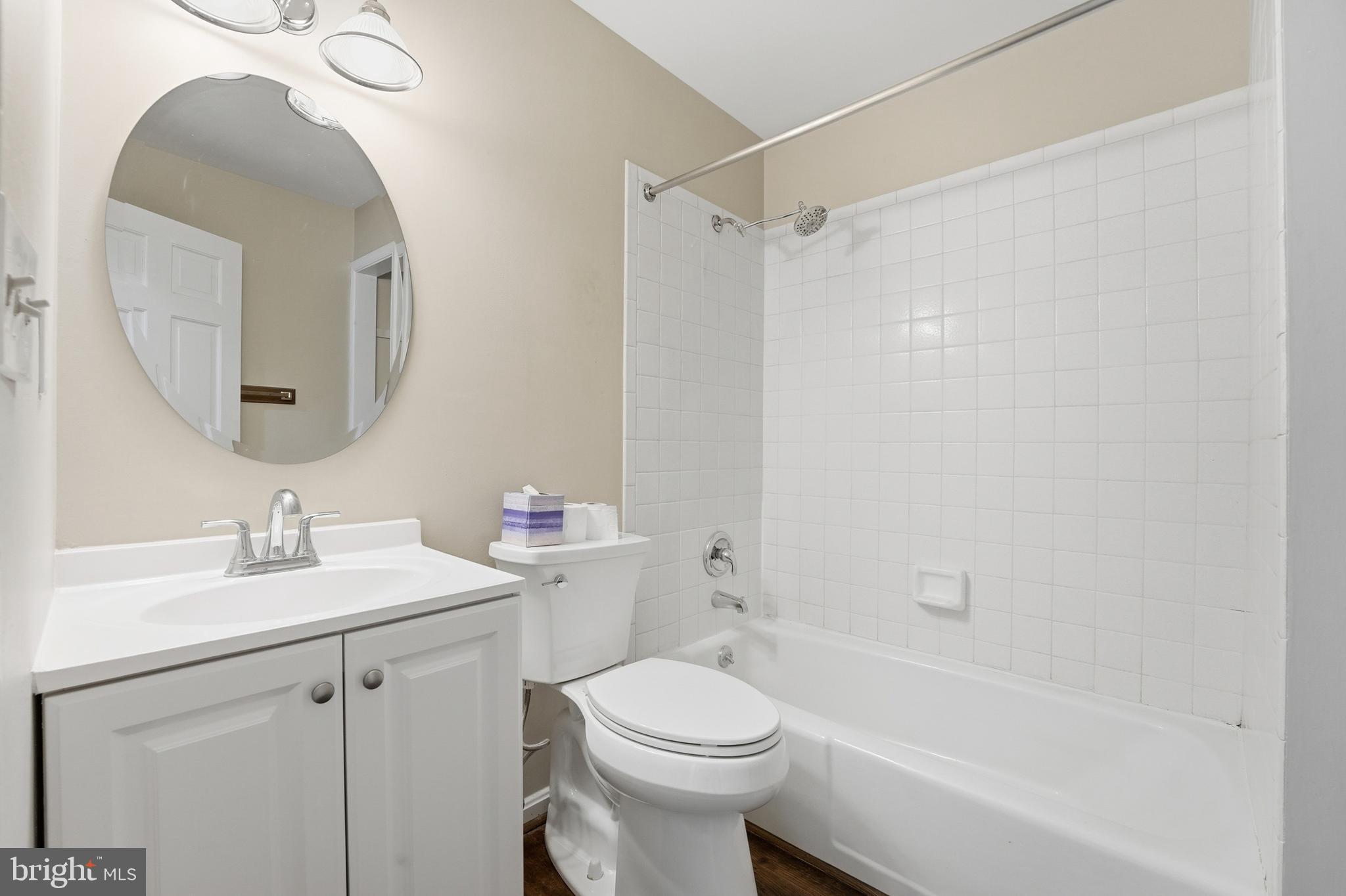 4431 Ringwood Road Nokesville, VA 20181 - Photo 10 of 14 a bathroom with a sink toilet and shower
