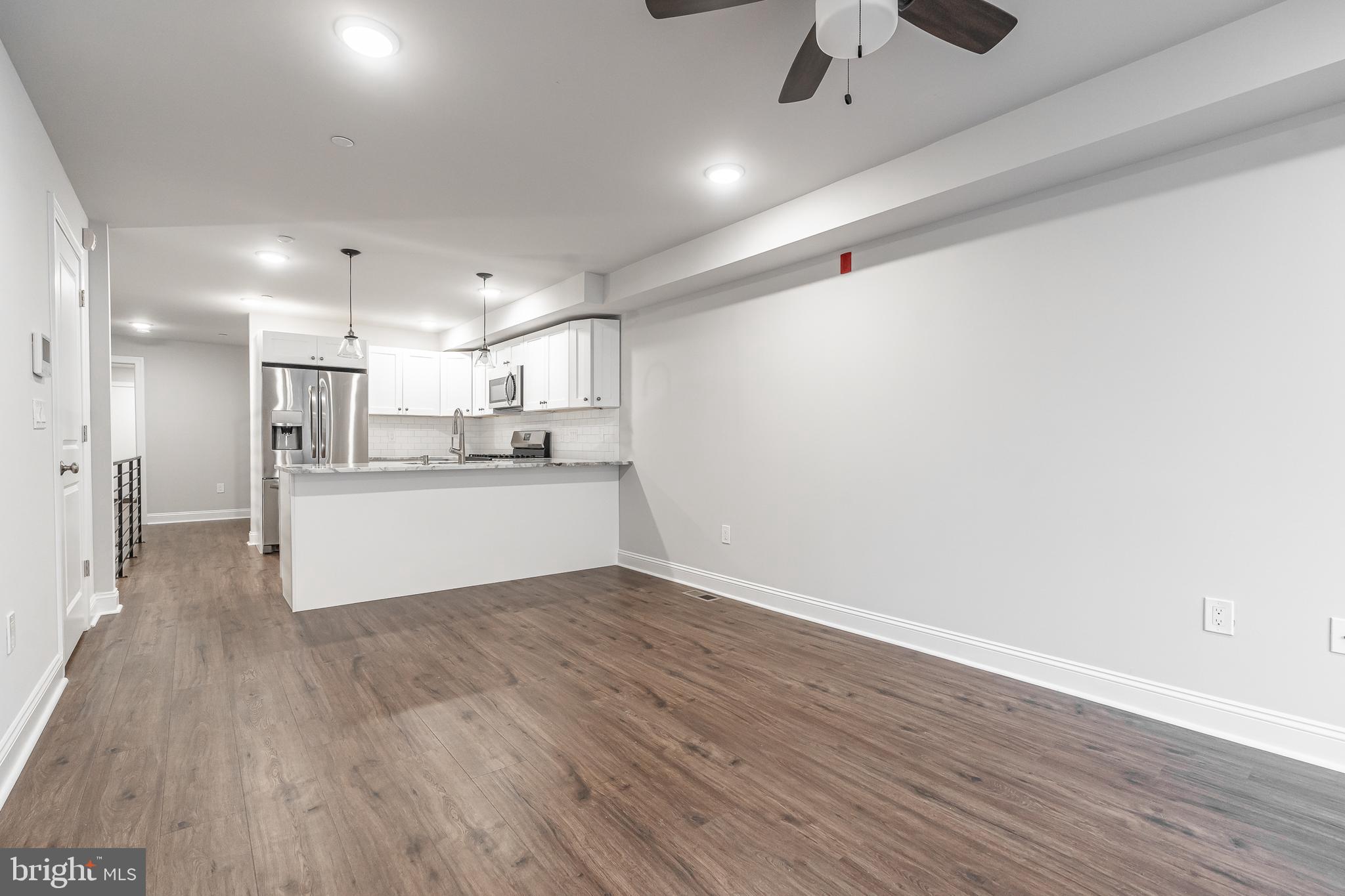 2202 Christian Street, Unit 1 Philadelphia, PA 19146 - Photo 3 of 27 a view of kitchen with wooden floor
