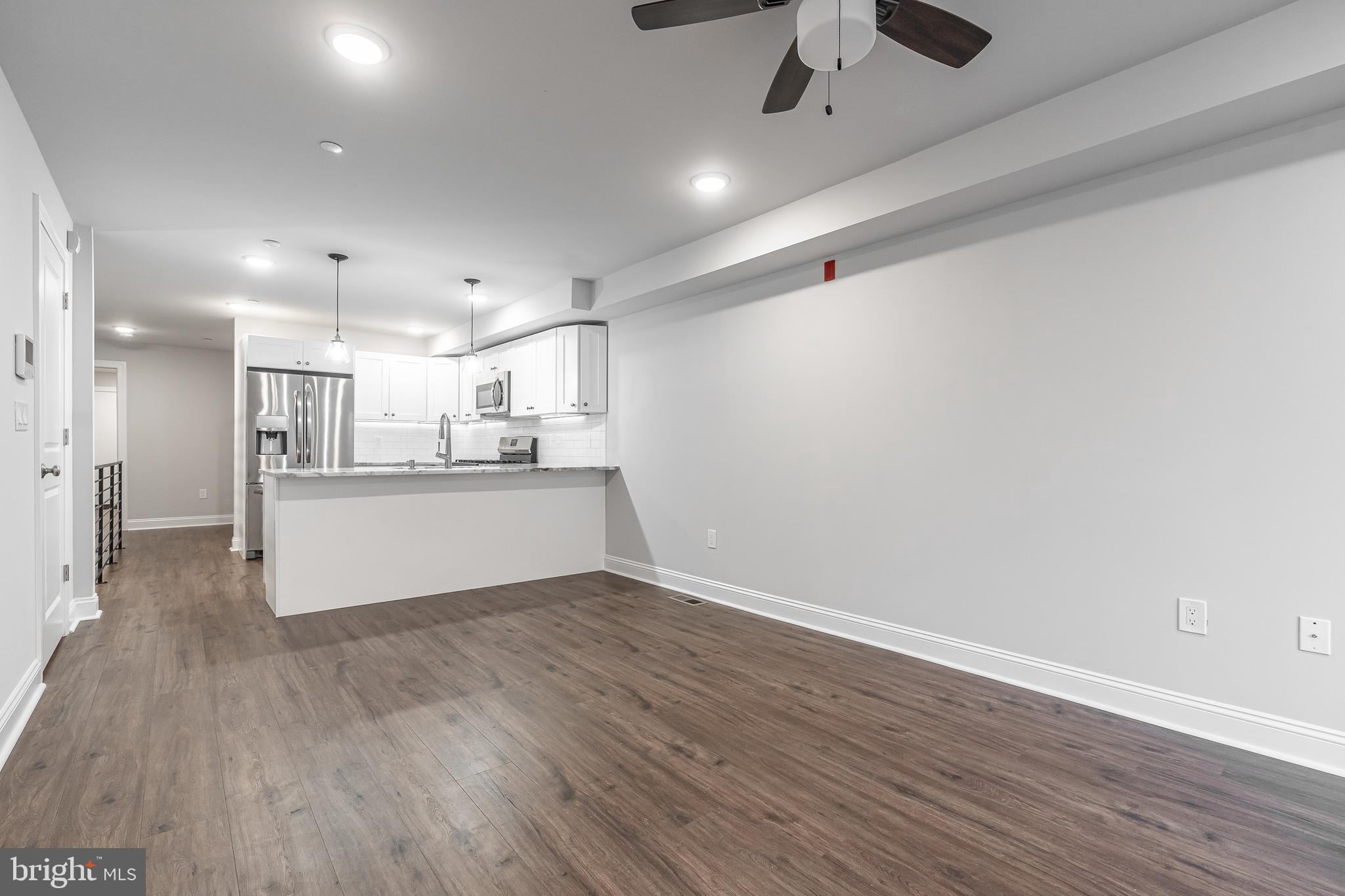 2202 Christian Street, Unit 1 Philadelphia, PA 19146 - Photo 5 of 27 a view of kitchen with wooden floor