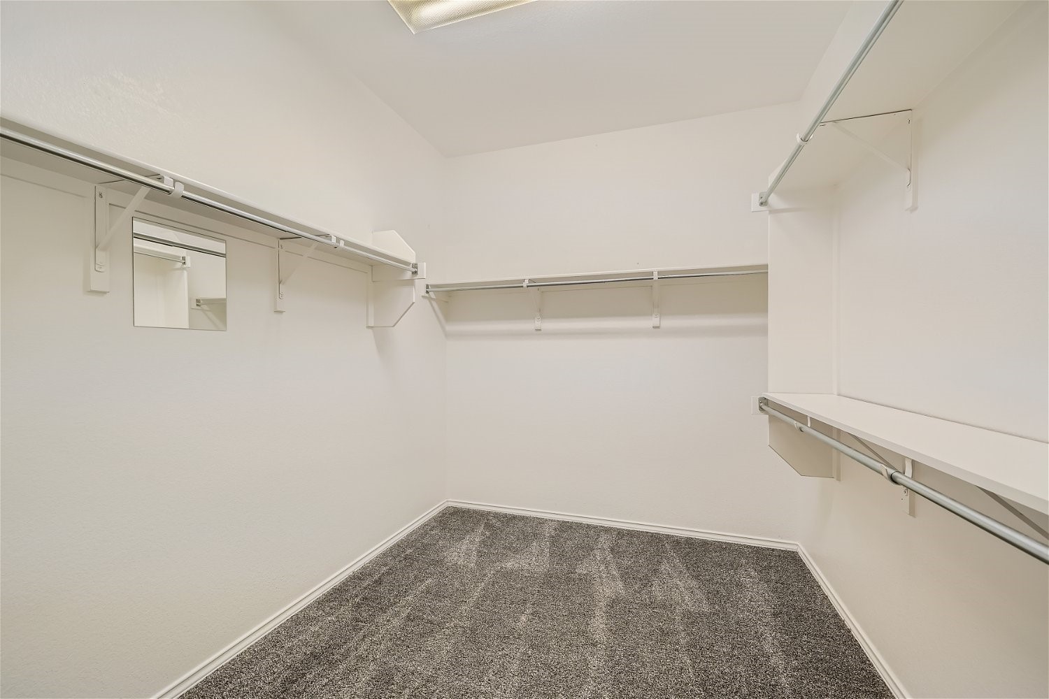 120 Muir Court Georgetown, TX 78633 - Photo 20 of 27 a view of a room with shelf on the wall