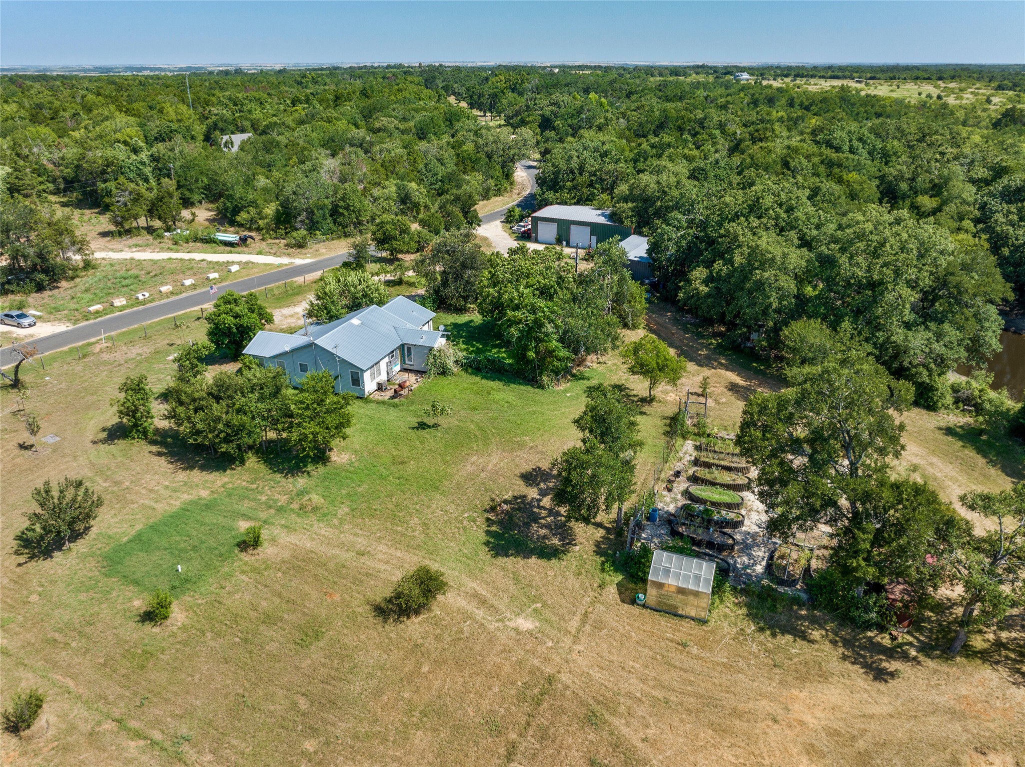 a view of a garden with an outdoor seating