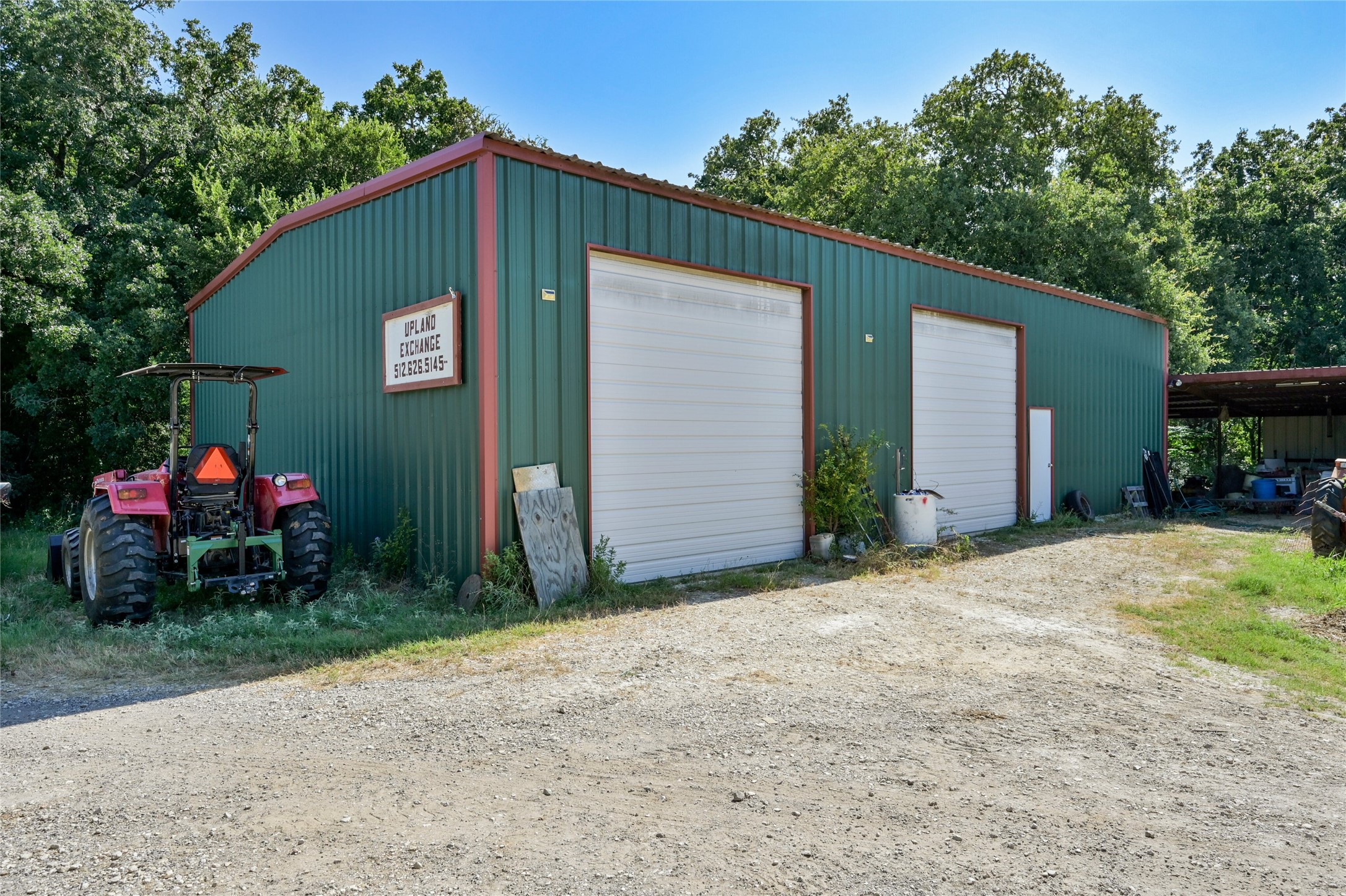 681 County Road 474 Elgin, TX 78621 - Photo 15 of 37 a front view of house with yard and trees