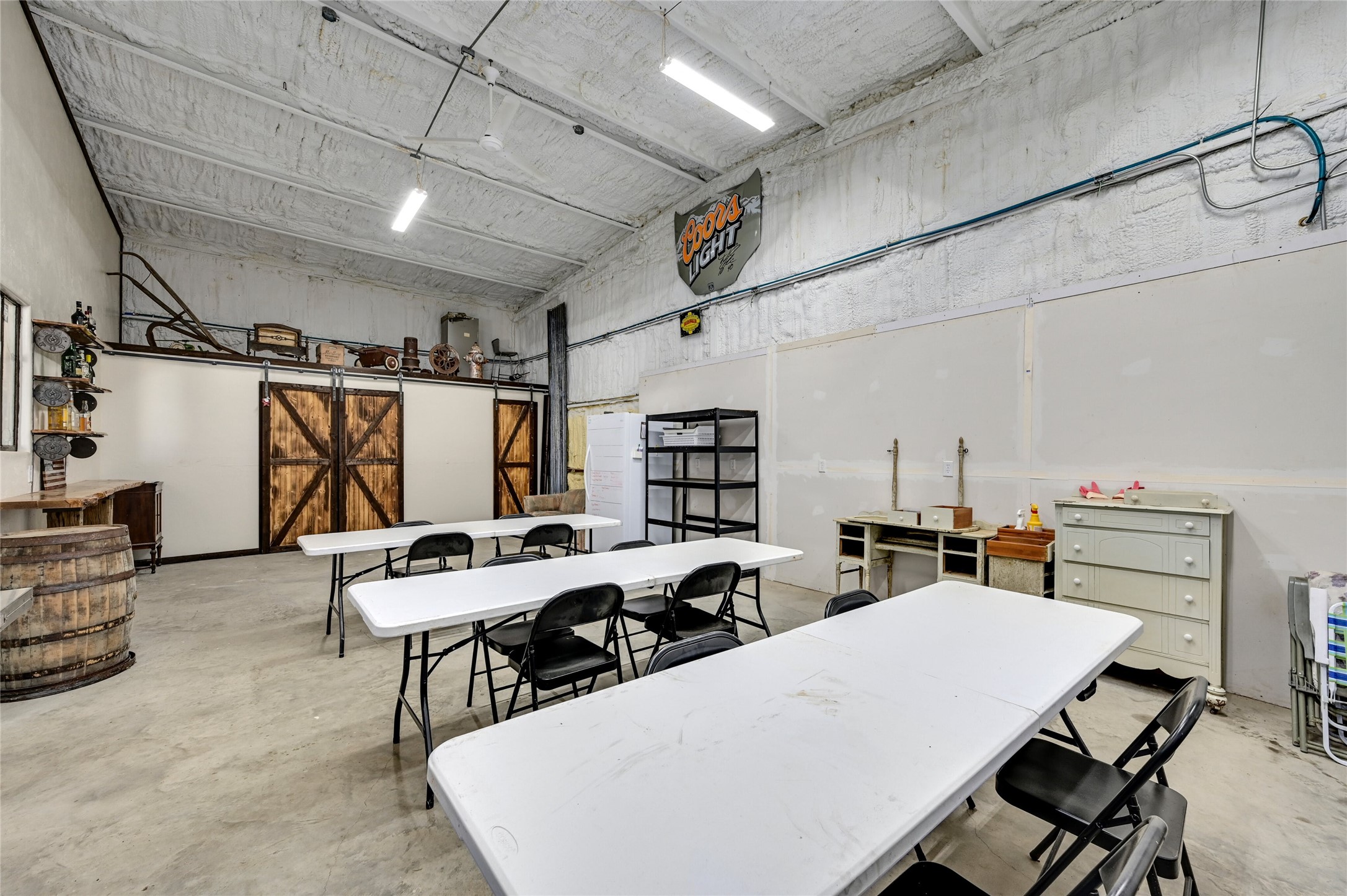 681 County Road 474 Elgin, TX 78621 - Photo 17 of 37 a room with furniture a rug and white walls