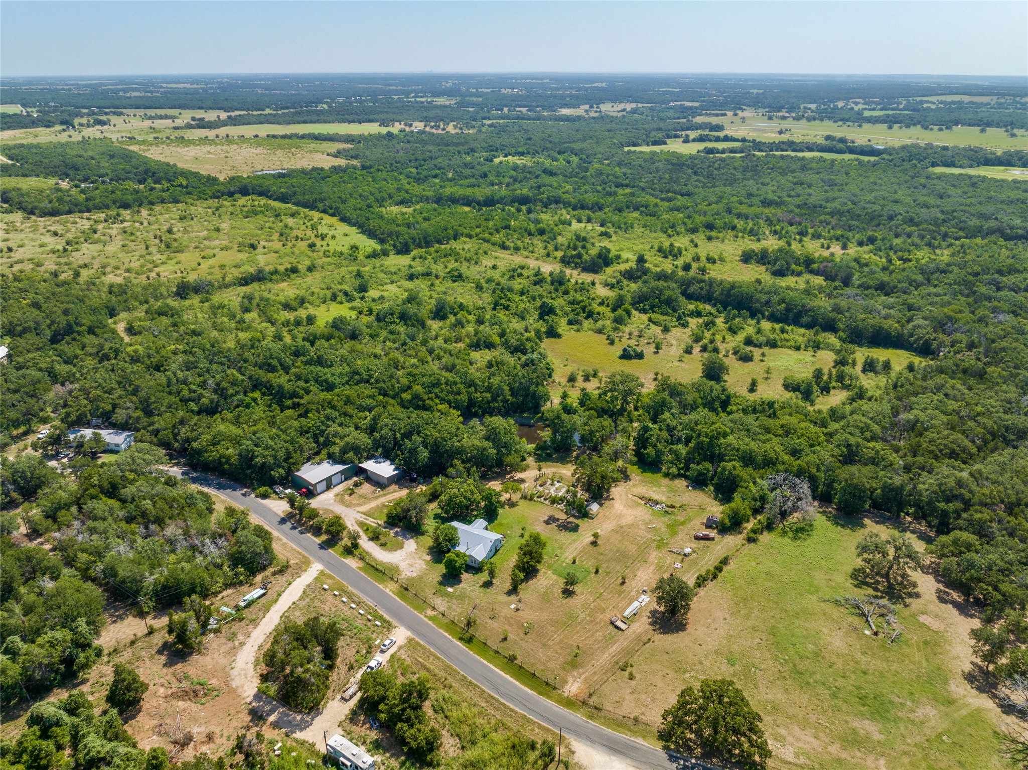 681 County Road 474 Elgin, TX 78621 - Photo 35 of 37 a view of a city with an ocean view