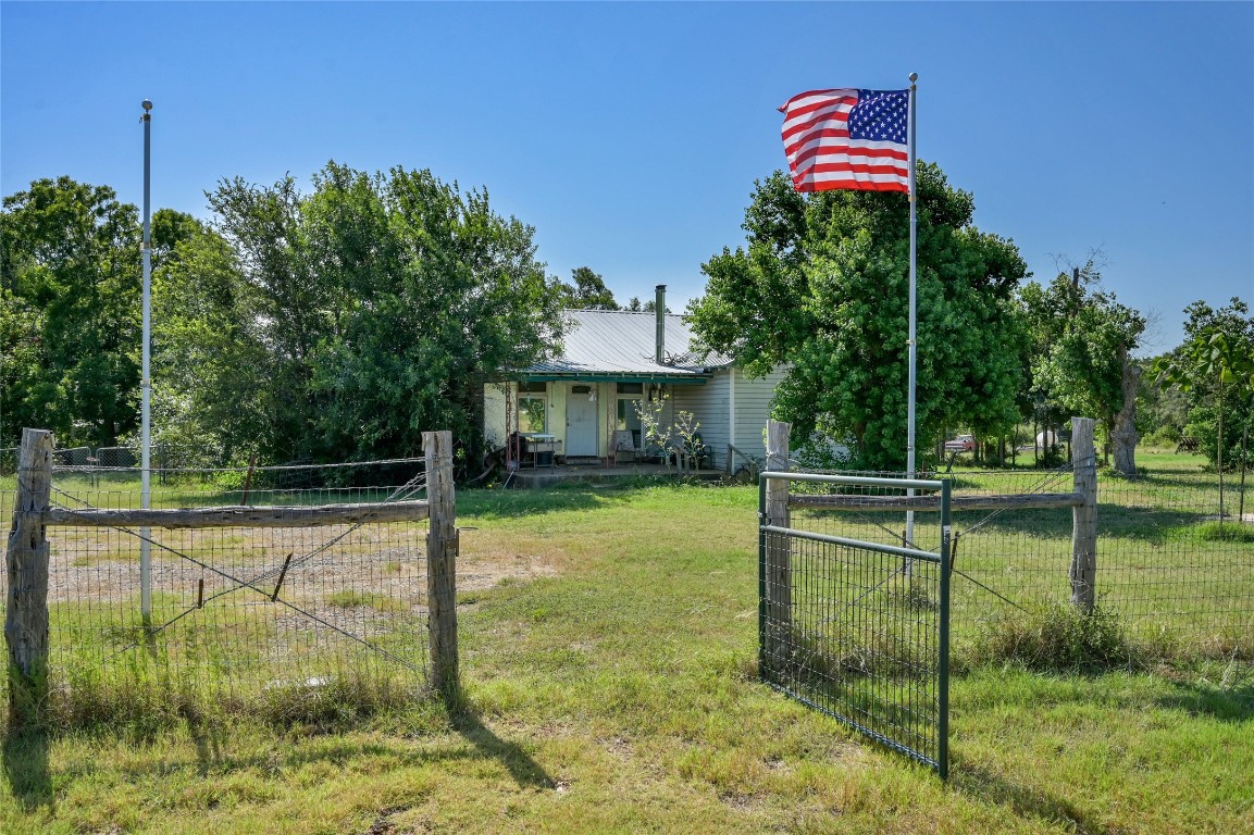 681 County Road 474 Elgin, TX 78621 - Photo 5 of 37 a view of a house with backyard