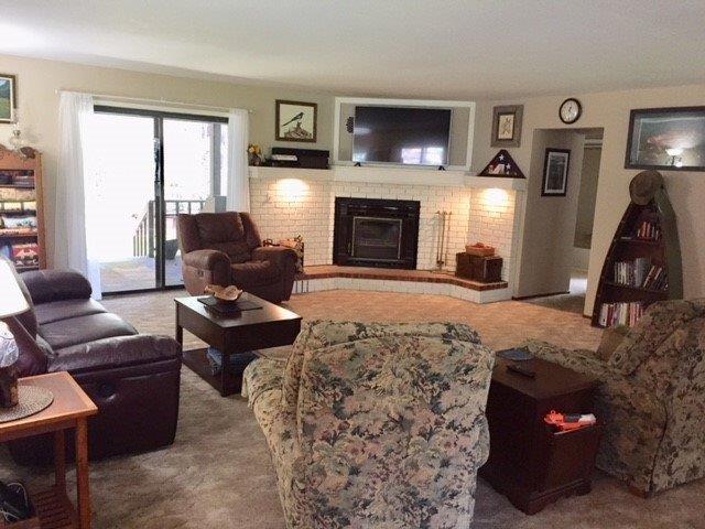 186 Sallsten Road Grants Pass, OR 97527 - Photo 13 of 34 Living room with sliding glass door to t