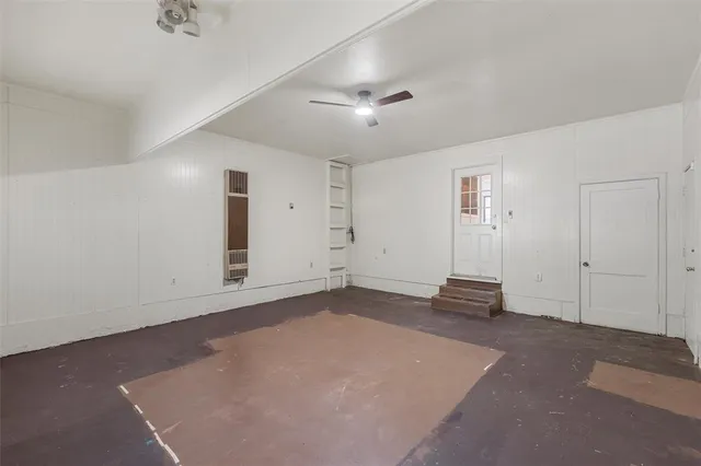 a front view of a house with a garden and porch