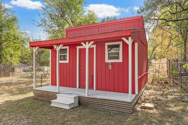 a picture of a bathroom with a shower