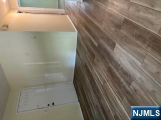 334 Grand Avenue, Unit 10 Leonia, NJ 07605 - Photo 1 of 10 a view of a room with wooden floor