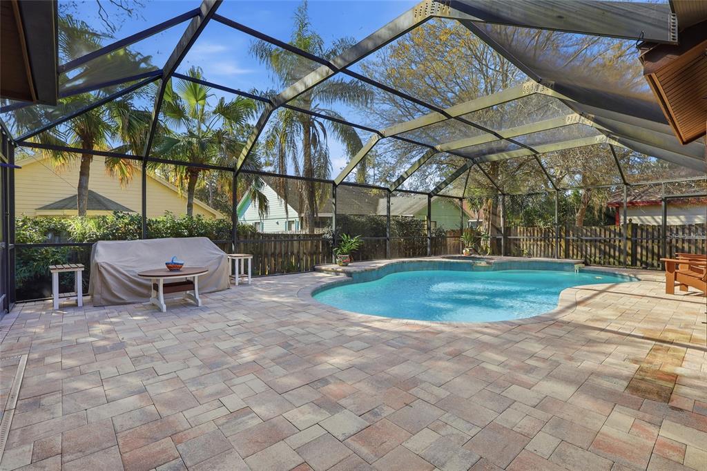 3488 Ridge Boulevard Palm Harbor, FL 34684 - Photo 27 of 30 a view of a backyard with table and chairs
