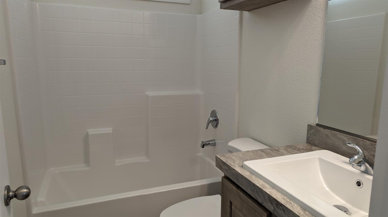 1354 Elliott Road, Unit 3 Paradise, CA 95969 - Photo 15 of 17 a bathroom with a sink a toilet and bathtub
