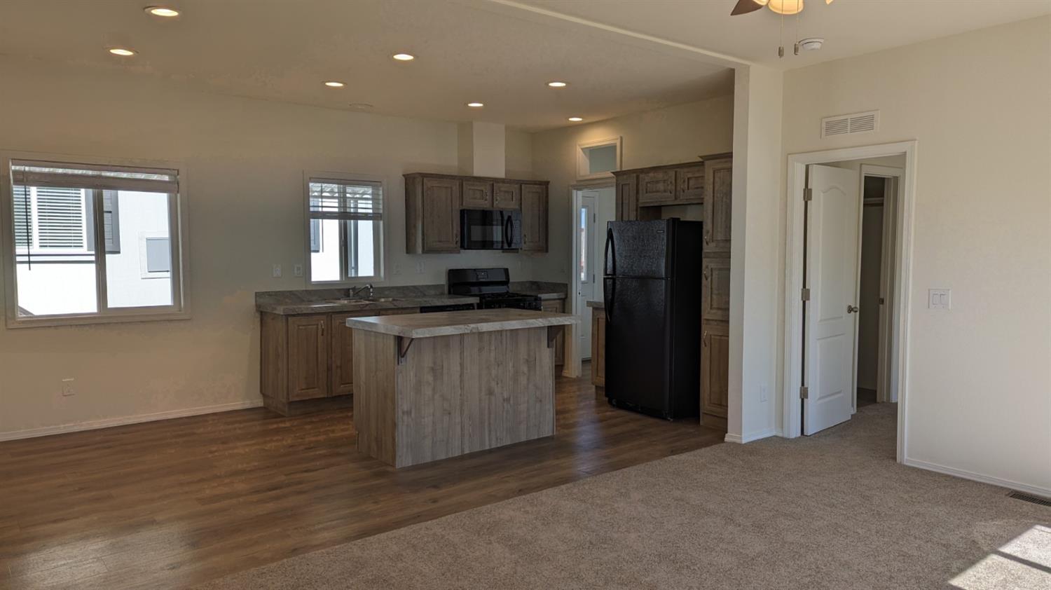 1354 Elliott Road, Unit 3 Paradise, CA 95969 - Photo 9 of 17 a kitchen with a refrigerator and a sink