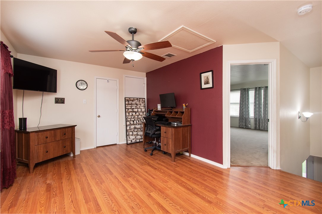 322 Fallen Leaf Lane Temple, TX 76502 - Photo 16 of 26 a view of a livingroom with a flat screen tv