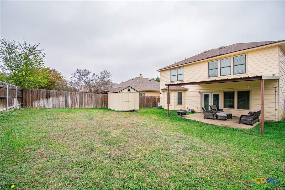322 Fallen Leaf Lane Temple, TX 76502 - Photo 25 of 26 a view of a house with backyard and sitting area