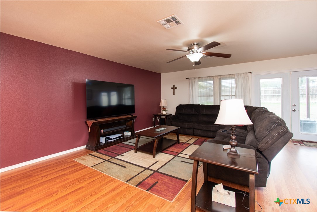 322 Fallen Leaf Lane Temple, TX 76502 - Photo 4 of 26 a living room with furniture and a flat screen tv
