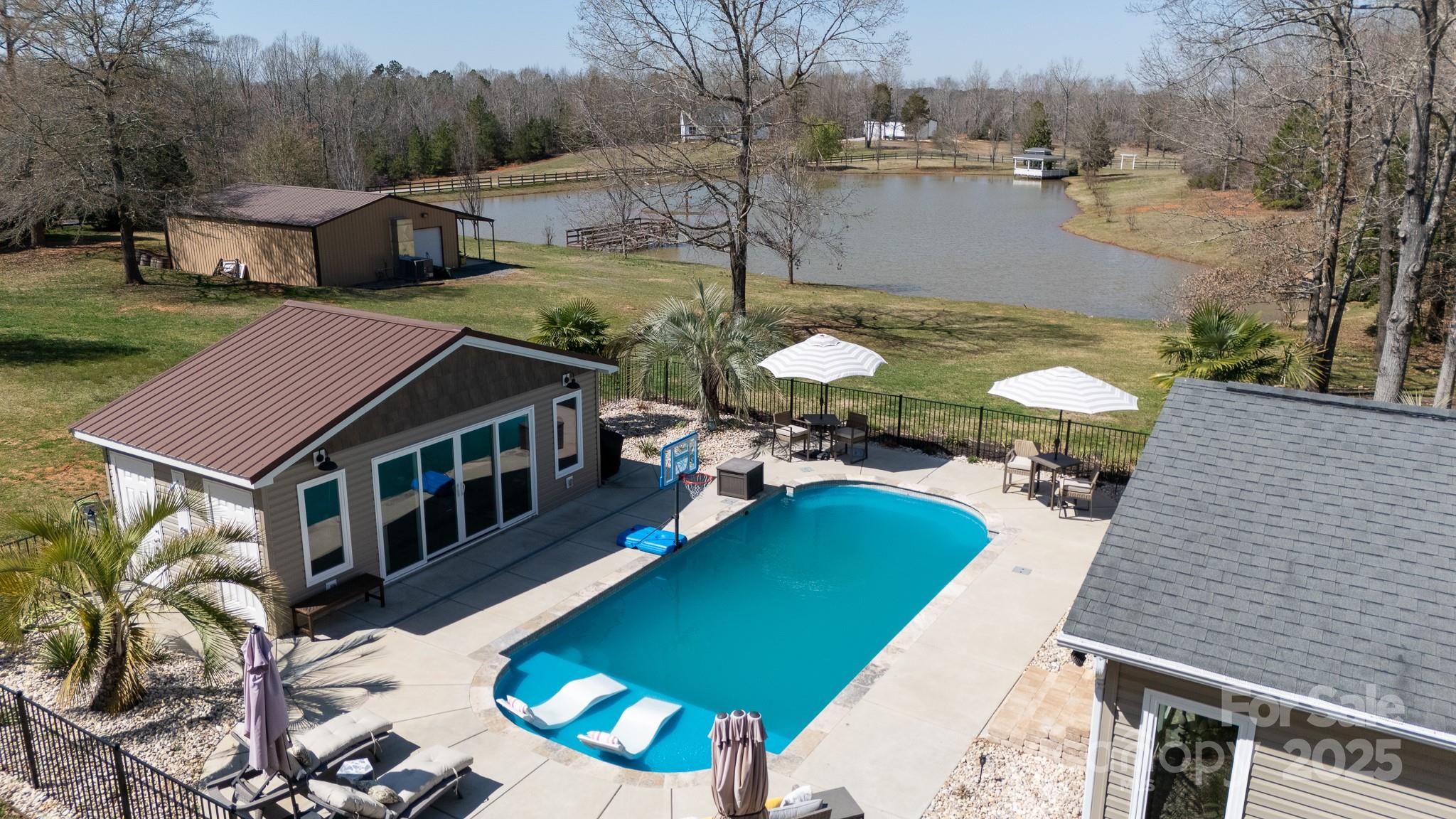 a balcony with table and chairs