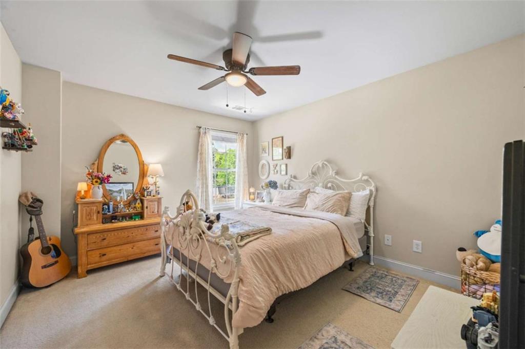 42 Pintail Lane Jefferson, GA 30549 - Photo 18 of 42 a bed room with a bed and a window