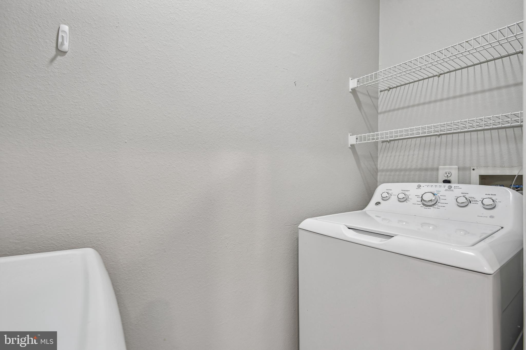 1530 Spring Gate Dr., Unit 9209 McLean, VA 22102 - Photo 21 of 41 Full size washer and dryer in unit