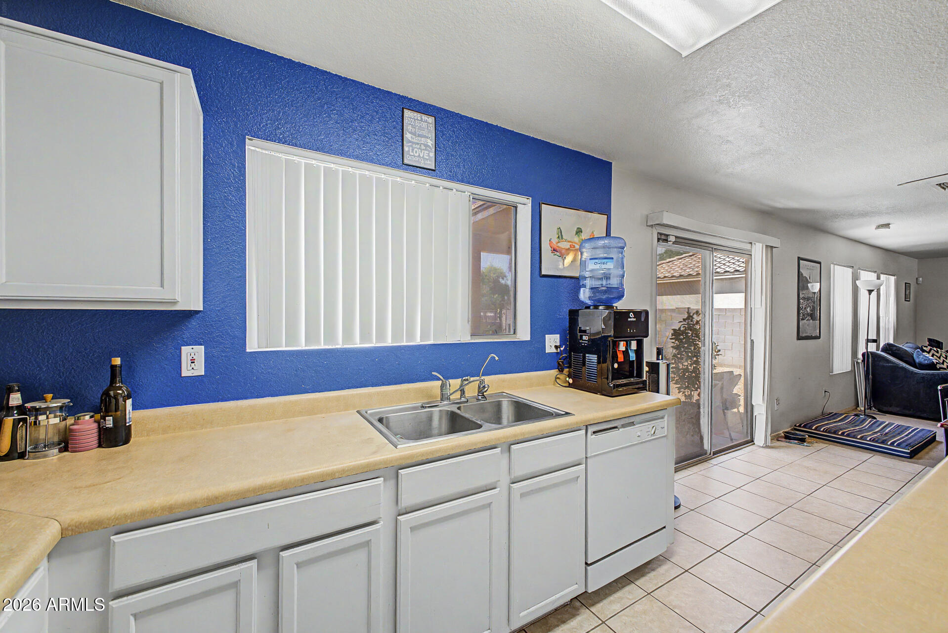 2607 West Bloch Road Phoenix, AZ 85041 - Photo 14 of 34 a kitchen that has a sink and cabinets