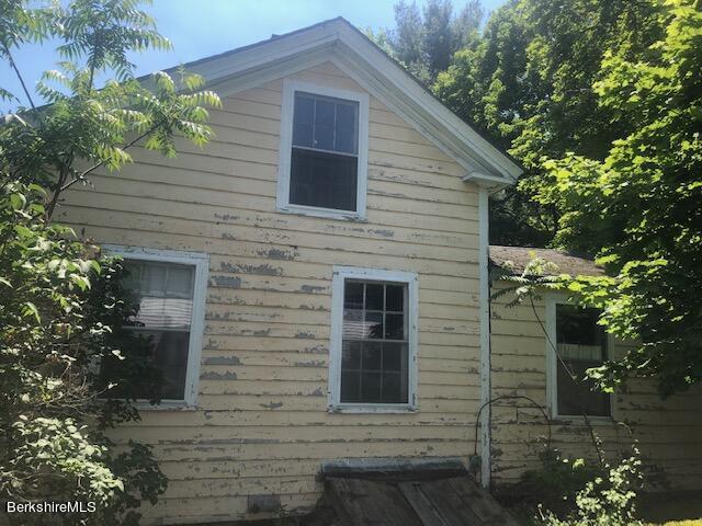 78 South Main Road Otis, MA 01253 - Photo 6 of 10 a view of a house with a yard
