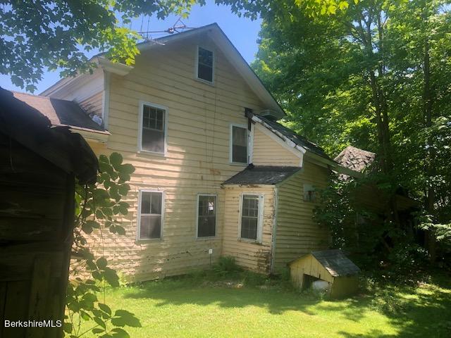 78 South Main Road Otis, MA 01253 - Photo 9 of 10 a view of a house with a yard