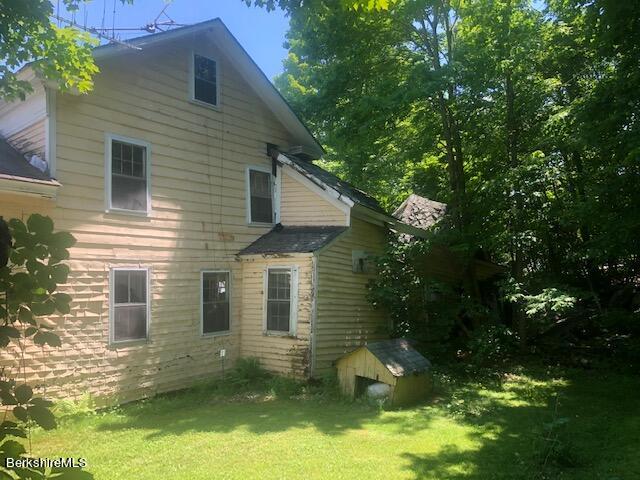 78 South Main Road Otis, MA 01253 - Photo 10 of 10 a view of a house with a yard