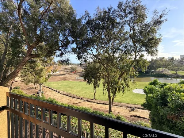 a view of a lake from a balcony