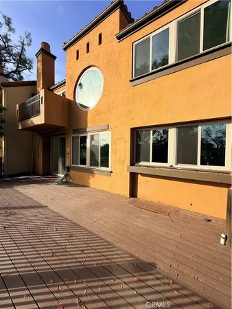 a view of a house with a roof deck
