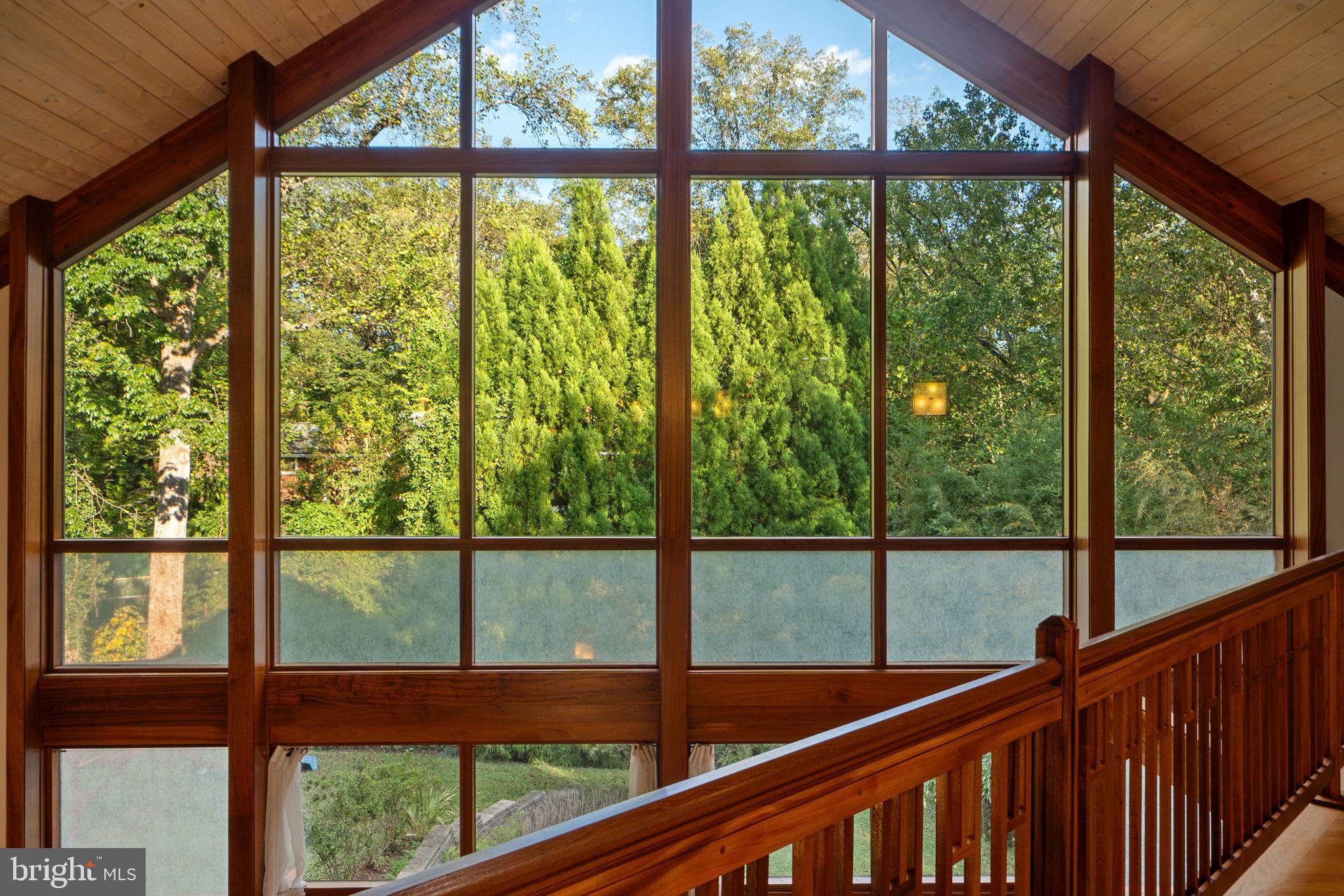6525 76th Street Cabin John, MD 20818 - Photo 30 of 50 a view of large windows and an outdoor view