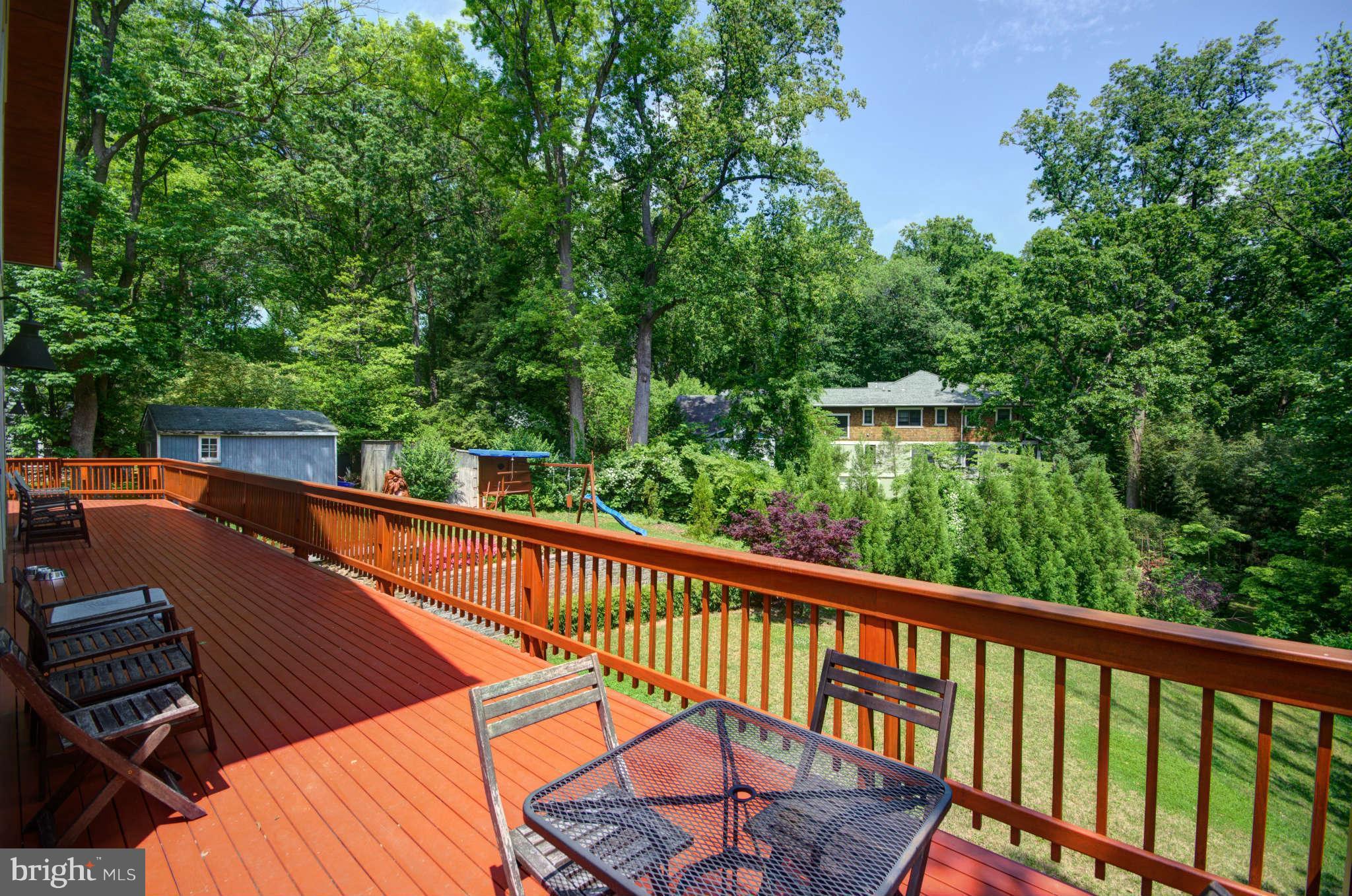 6525 76th Street Cabin John, MD 20818 - Photo 47 of 50 a view of a two chairs in the balcony